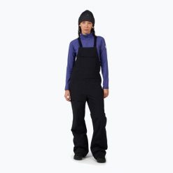 Spodnie narciarskie damskie Rossignol Outerlimits Insulated Bib. Czarne spodnie dresowe damskie Rossignol, bez wzorów, sportowe. Za 941.41 zł.