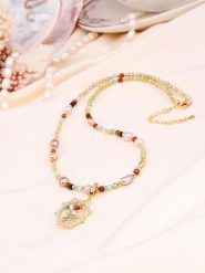 L'Atelier de Gaia Pozłacany naszyjnik z elementami ozdobnymi - dł. 50 cm rozmiar: onesize. Czerwone naszyjniki damskie L'Atelier de Gaia, pozłacane. Za 86.99 zł.