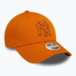 Czapka z daszkiem damska New Era League Essential 9FORTY New York Yankees. Brązowe czapki z daszkiem damskie New Era, bez wzorów. Za 109.99 zł.