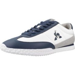 Kapcie LE COQ SPORTIF VELOCE Biały. Białe kapcie damskie Le Coq Sportif, ze skóry. Za 308.80 zł.