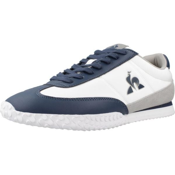 Kapcie LE COQ SPORTIF VELOCE Biały. Białe kapcie damskie Le Coq Sportif, ze skóry. Za 307.90 zł.