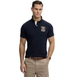 Koszulka polo z logo Superdry. Niebieskie koszulki polo męskie Superdry., m, z aplikacjami, bez ramiączek. Za 275.10 zł.