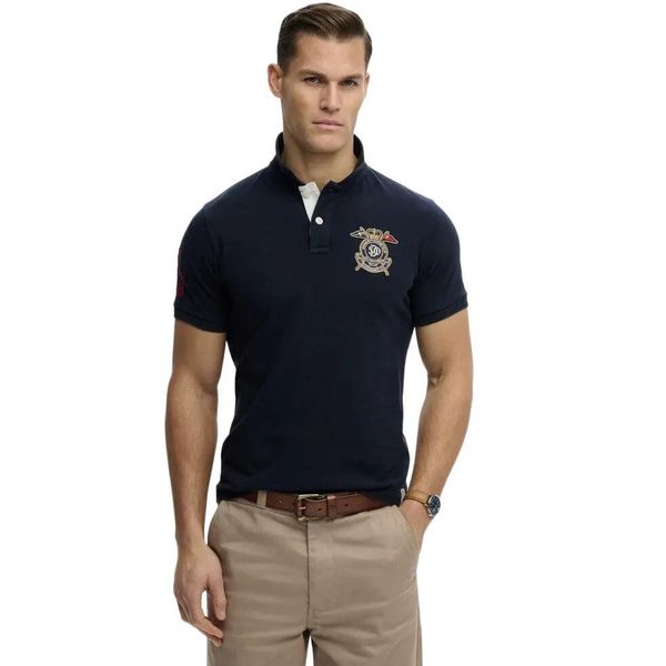 Koszulka polo z logo Superdry. Niebieskie koszulki polo męskie Superdry., m, z aplikacjami, bez ramiączek. Za 275.10 zł.