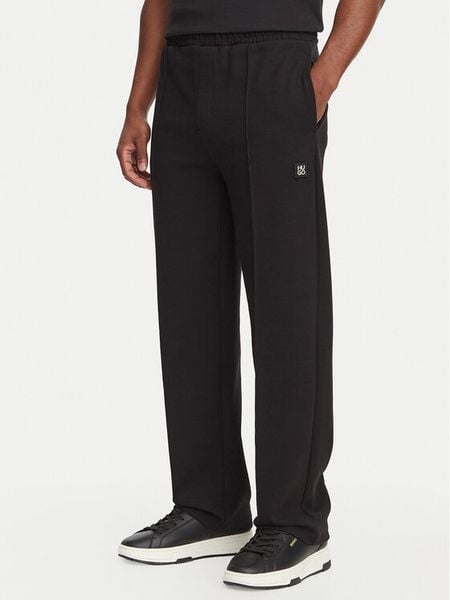 HUGO Spodnie dresowe Dabinpant 50563020 Czarny Relaxed Fit. Czarne spodnie dresowe męskie Hugo, bez wzorów, z bawełny. Za 679.99 zł.