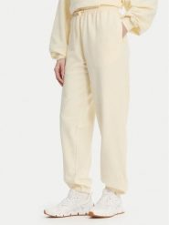 Reebok Spodnie dresowe RK25529CCW Żółty Regular Fit. Żółte spodnie dresowe damskie Reebok, m, bez wzorów, z dresówki. Za 199.99 zł.