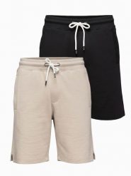 Zestaw dwóch męskich szortów dresowych basic - czarne/beżowe V1 - Rozmiar: L. Czarne szorty męskie Ombre Clothing, z aplikacjami, z bawełny, sportowe. Za 255.99 zł.