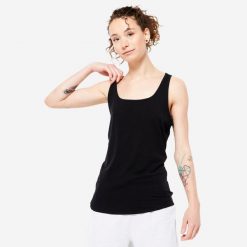 Koszulka bez rękawów damska Domyos Gym & Pilates slim. Niebieskie bluzki sportowe damskie DOMYOS, s, bez wzorów, z bawełny, bez ramiączek. Za 39.99 zł.