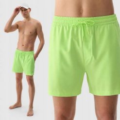 SPODENKI MĘSKIE 4F SPORTOWE PLAŻOWE KĄPIELOWE PRZED KOLANO KOLOR ZIELONY. Zielone kąpielówki męskie 4f, l, bez wzorów, z materiału, do biegania. Za 79.99 zł.