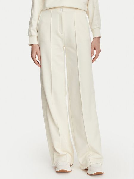 Guess Spodnie materiałowe V6YB26 K5139 Kremowy Relaxed Fit. Białe spodnie materiałowe damskie Guess, z aplikacjami, z bawełny. Za 434.99 zł.