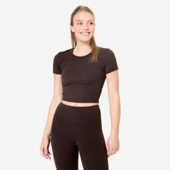 Koszulka do jogi i pilatesu Breathe. Zielone bluzki damskie DOMYOS, l, bez wzorów, z elastanu, sportowe, bez kołnierzyka, bez ramiączek. Za 64.99 zł.