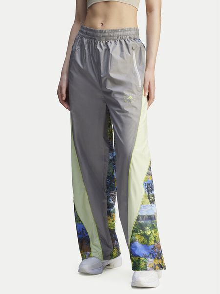 Adidas by Stella McCartney Spodnie dresowe Earth Collage JG5794 Szary Loose Fit. Szare spodnie dresowe damskie adidas by Stella McCartney, s, bez wzorów, z dresówki. Za 429.99 zł.