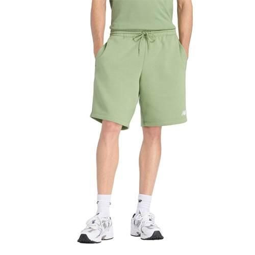 Spodnie sportowe męskie New Balance MS43903AAR. Zielone spodnie sportowe męskie New Balance, bez wzorów, z materiału, sportowe. Za 225.00 zł.