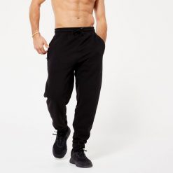 Spodnie dresowe męskie Domyos Gym & Pilates. Szare spodnie sportowe męskie DOMYOS, z bawełny. Za 89.99 zł.