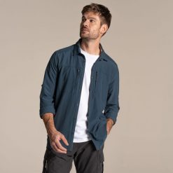 Koszula Craghoppers NosiLife Pro V. Niebieskie koszule męskie CRAGHOPPERS, m, bez wzorów, bez kołnierzyka, bez ramiączek. Za 529.60 zł.