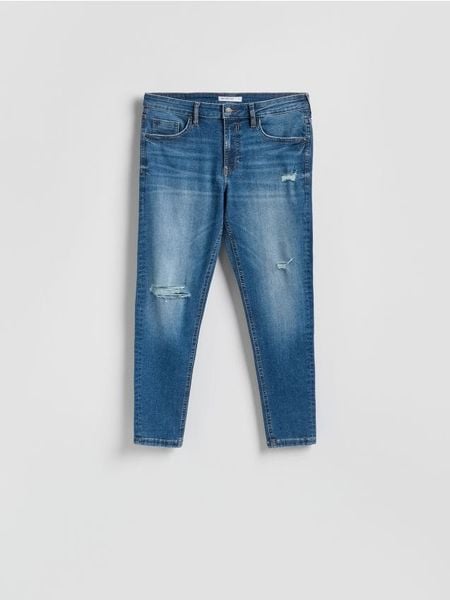 Jeansy skinny z przetrciami - niebieski. Niebieskie jeansy męskie Reserved. Za 129.99 zł.