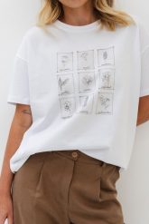 T-SHIRT ERICA "KWIATY" BIAŁY One size - Flawless. Białe t-shirty damskie Flawless, uniwersalny, bez wzorów, z bawełny, bez kołnierzyka. Za 196.00 zł.