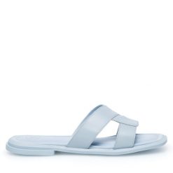 Klapki Gino Rossi. Niebieskie klapki damskie Gino Rossi, bez wzorów, bez obcasa. Za 179.99 zł.