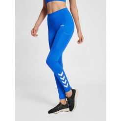 Damskie legginsy mid-rise Hummel MT Chipo. Niebieskie legginsy sportowe damskie HUMMEL, bez wzorów, na fitness i siłownię. Za 212.55 zł.