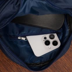 Plecak plecaczek damski mały lekki trzykomorowy wodoodporny elegancki granatowy Beltimore R36. Niebieskie plecaki damskie bez wzorów, eleganckie. Za 59.90 zł.