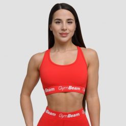 Biustonosz damski fitness bez wkładek czerwony Simple. Czerwone biustonosze sportowe damskie GYMBEAM, bez wzorów, z elastanu. Za 59.90 zł.