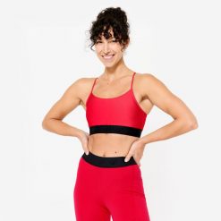 Stanik sportowy Domyos. Czarne biustonosze sportowe damskie DOMYOS, bez wzorów, z elastanu. W wyprzedaży za 39.99 zł.