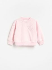 Luźna bluza - pastelowy róż. Czerwone bluzy i bluzki niemowlęce Reserved, bez wzorów, z bawełny, bez ramiączek, bez kaptura. Za 45.99 zł.