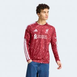Koszulka piłkarska długi rękaw ADIDAS FC Liverpool sezon 26/27 domowa. Bluzki sportowe damskie Adidas, xl, z materiału, bez kołnierzyka, bez ramiączek. Za 489.99 zł.