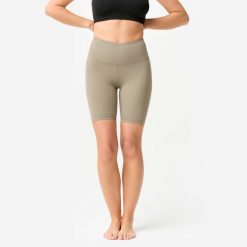 Legginsy krótkie do jogi i pilatesu Domyos. Brązowe legginsy damskie DOMYOS, s, bez wzorów, z elastanu. Za 69.99 zł.