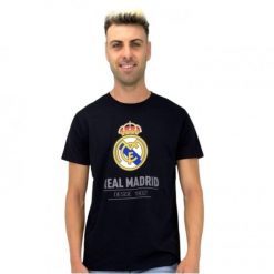 T-shirt piłkarski męski Real Madryt cotton tee czarny. Czarne t-shirty męskie Real Madrid, l, bez wzorów, bez kołnierzyka. Za 100.97 zł.