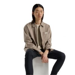 Kurtka letnia męska New Balance Squad Mag. Brązowe kurtki męskie New Balance, na lato, m, bez wzorów, z materiału, eleganckie, bez kaptura. Za 901.99 zł.
