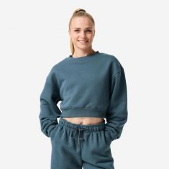 Bluza fitness damska Domyos crop. Niebieskie bluzy sportowe damskie DOMYOS, l, bez wzorów, z bawełny, bez ramiączek, krótkie, bez kaptura. Za 129.99 zł.