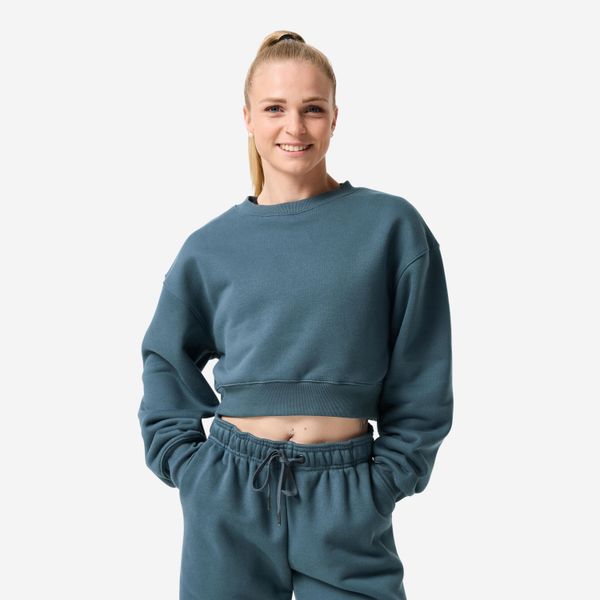 Bluza fitness damska Domyos crop. Niebieskie bluzy sportowe damskie DOMYOS, l, bez wzorów, z bawełny, bez ramiączek, krótkie, bez kaptura. Za 129.99 zł.