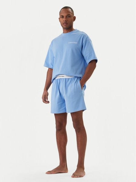 Calvin Klein Underwear Piżama LV00NM2949 Błękitny Relaxed Fit. Niebieskie piżamy męskie Calvin Klein Underwear, m, bez wzorów, z bawełny, bez ramiączek. Za 299.99 zł.