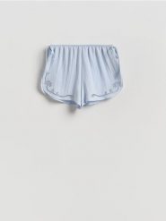 Szorty plażowe z wiskozą - jasnoniebieski. Niebieskie szorty damskie Reserved, bez wzorów, z tkaniny. Za 79.99 zł.