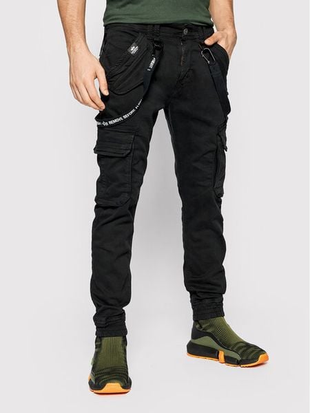 Alpha Industries Spodnie materiałowe Utility 128202 Czarny Slim Fit. Czarne spodnie materiałowe męskie Alpha Industries, bez wzorów, z bawełny. Za 429.99 zł.
