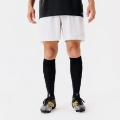 Spodenki piłkarskie Kipsta Essential Club. Czarne szorty damskie KIPSTA, bez wzorów, z materiału, sportowe. Za 24.99 zł.