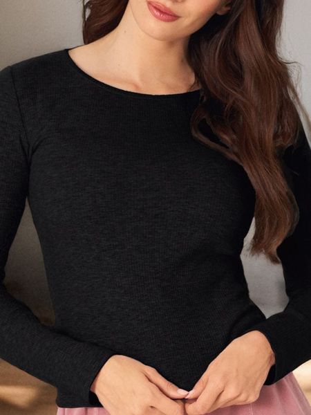 Koszulka z długimi rękawami - czarny. Czarne t-shirty damskie Sinsay, l, bez wzorów, z materiału, bez kołnierzyka. Za 11.99 zł.