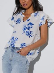 Milan Kiss Bluzka w kolorze biało-niebieskim rozmiar: L. Białe bluzki damskie Milan Kiss, l, bez wzorów, bez kołnierzyka, bez ramiączek. Za 122.67 zł.