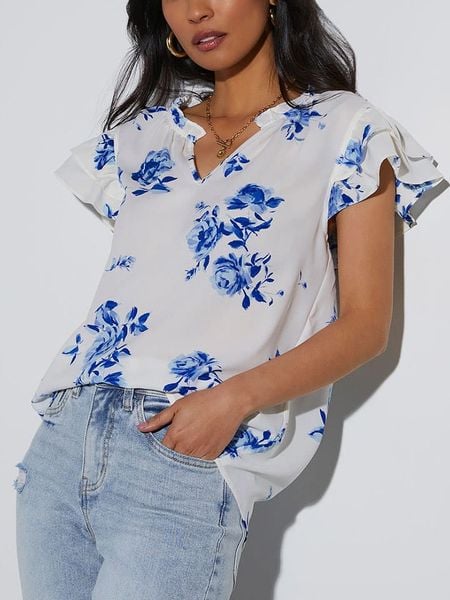 Milan Kiss Bluzka w kolorze biało-niebieskim rozmiar: L. Białe bluzki damskie Milan Kiss, l, bez wzorów, bez kołnierzyka, bez ramiączek. Za 122.67 zł.