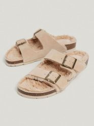 Pepe Jeans FOOTWEAR Skórzane klapki w kolorze beżowym rozmiar: 36. Brązowe klapki damskie Pepe Jeans FOOTWEAR, bez wzorów, z jeansu, bez obcasa. Za 105.38 zł.