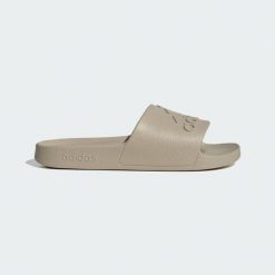 Klapki adilette Aqua. Brązowe klapki i japonki męskie Adidas, z materiału. Za 99.95 zł.