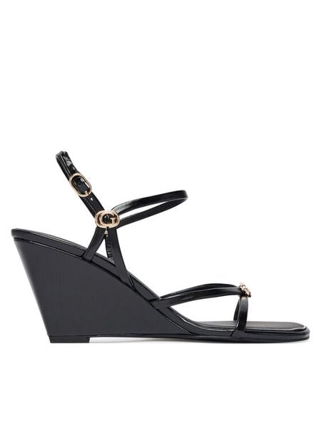 Guess Sandały FLTDVV PAF04 Czarny. Czarne sandały damskie Guess, z aplikacjami, ze skóry, bez obcasa, na koturnie. Za 494.99 zł.