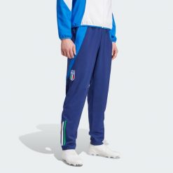 Spodnie Italy Tiro 24 Competition Presentation. Niebieskie spodnie materiałowe męskie Adidas, bez wzorów, z dresówki, klasyczne, z standardowym stanem. Za 234.10 zł.