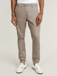 G-Star Spodnie chino - Slim fit - w kolorze beżowym rozmiar: W27/L30. Brązowe spodnie materiałowe męskie G-Star, bez wzorów, z bawełny, retro. Za 136.13 zł.