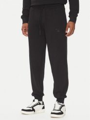Richmond X Spodnie dresowe UMP25008PA Czarny Regular Fit. Czarne spodnie dresowe męskie RICHMOND X, bez wzorów, z bawełny. Za 219.99 zł.
