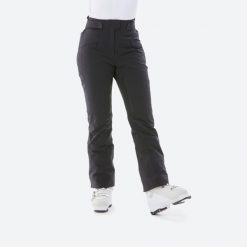 Spodnie narciarskie damskie Quechua 900. Czarne spodnie dresowe damskie WED'ZE, bez wzorów, z materiału, sportowe. Za 579.99 zł.