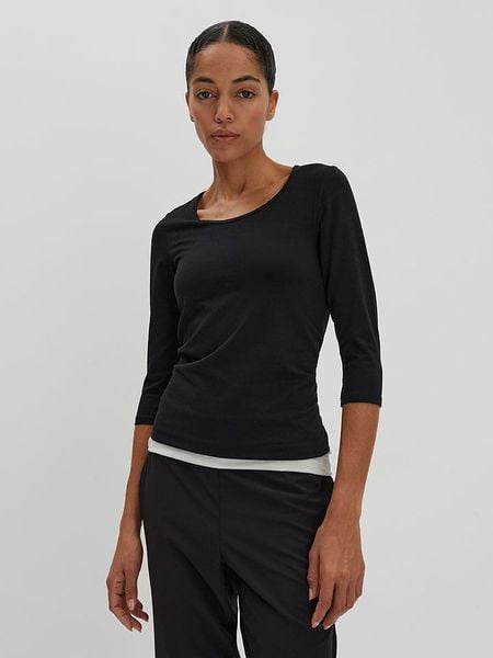 Someday Koszulka w kolorze czarnym rozmiar: 40. Czarne bluzki damskie Someday, bez wzorów, z bawełny, bez kołnierzyka, bez ramiączek. Za 65.99 zł.