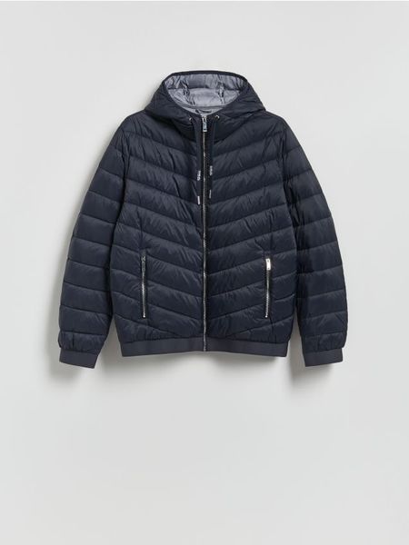 Pikowana kurtka z kapturem - granatowy. Niebieskie kurtki męskie Reserved, l, bez wzorów, z kapturem. Za 199.99 zł.