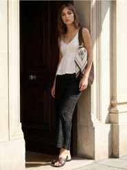 Ażurowe spodnie straight leg - czarny. Czarne spodnie materiałowe damskie Sinsay, w ażurowe wzory. Za 59.99 zł.