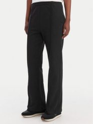 Calvin Klein Jeans Spodnie dresowe Archive Logo LV047B240G Czarny Regular Fit. Czarne jeansy damskie Calvin Klein Jeans, xs, bez wzorów, z bawełny. Za 369.99 zł.